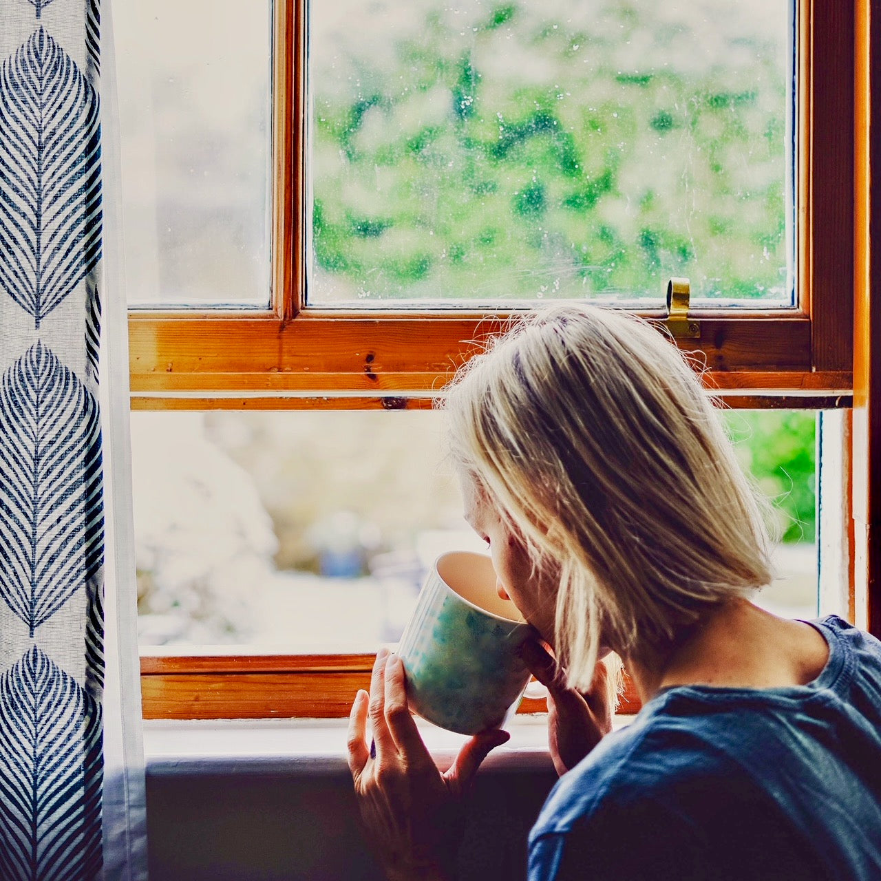 Morning Tea Routine by Wild Orchard Tea, image of woman drinking organic tea