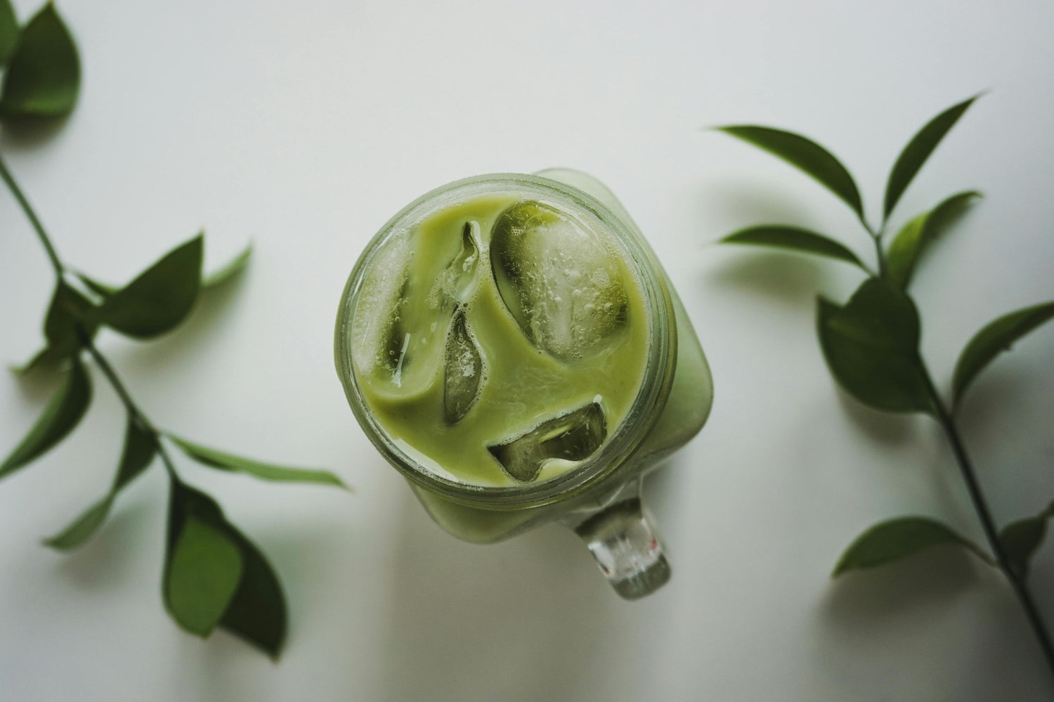 Blog: Why Our Organic Matcha Green Tea is Crafted for Lattes, image of matcha iced latte by Wild Orchard