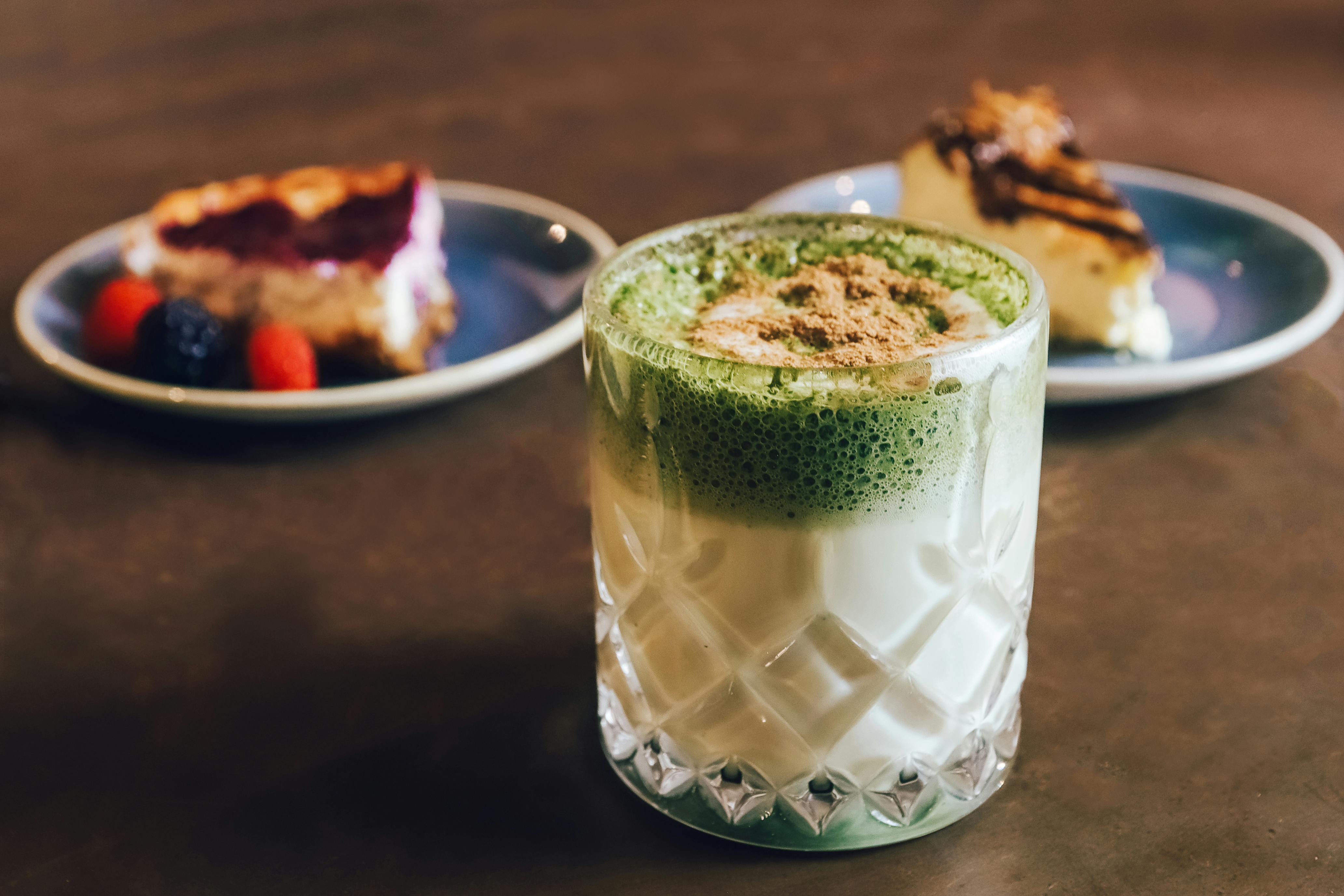 Blog: Matcha Latte Recipes, image of matcha latte with desserts