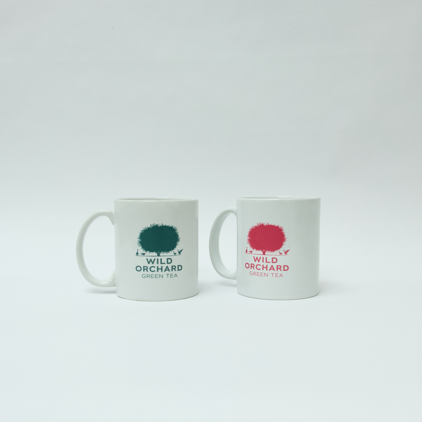 Wild Orchard Tea Mugs in Green and in Rose colors, image of tea mug