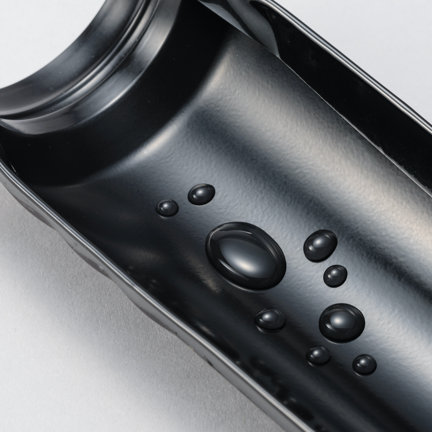 KYOCERA Ceramic Coated Twist Top Thermos offered by Wild Orchard Tea, image of the inside of the thermos