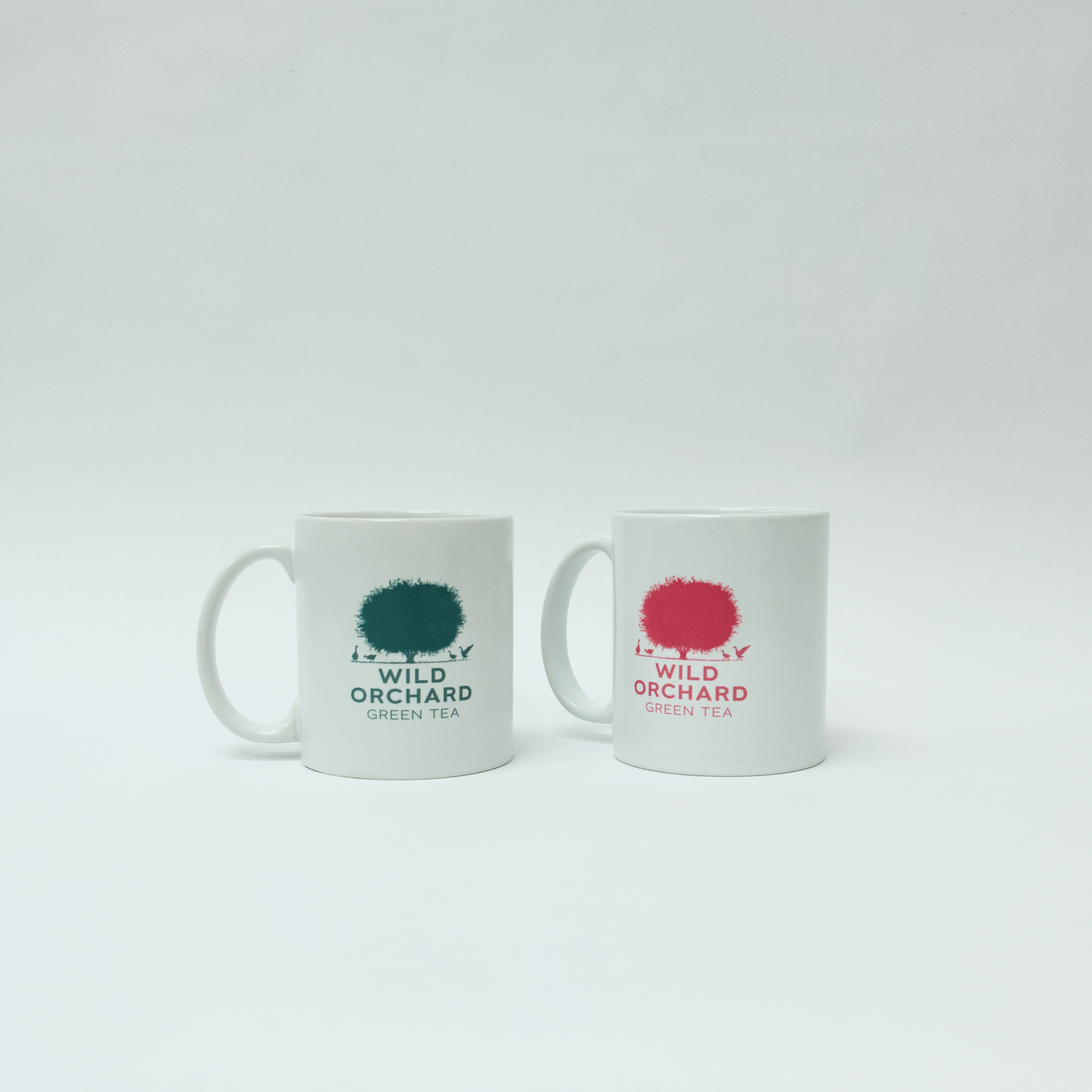 Wild Orchard Tea Mugs in Green and in Rose colors, image of tea mug