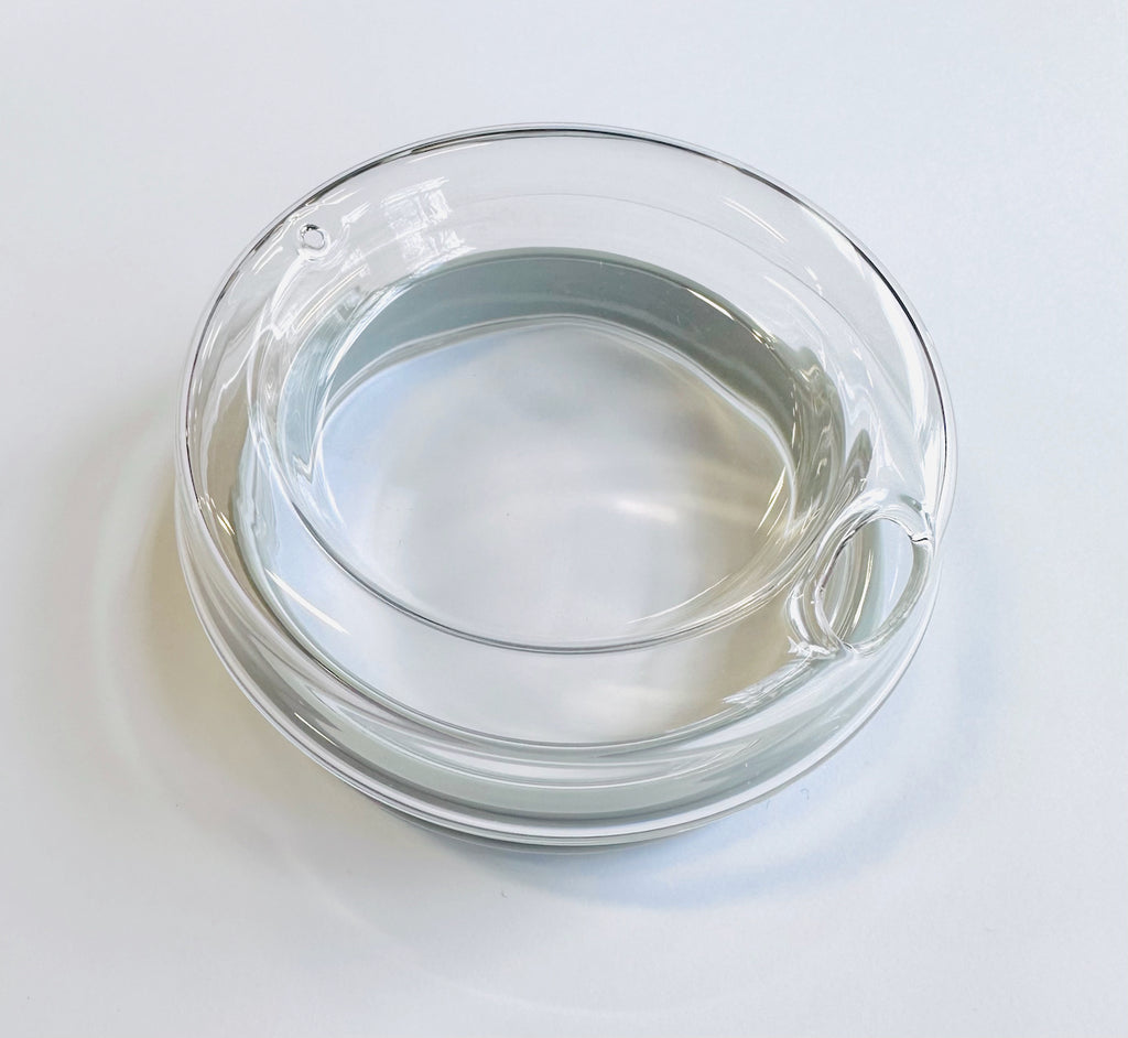 POKETLE All Glass Travel Mug with Silicone Grip at Wild Orchard Tea, close up of glass lid
