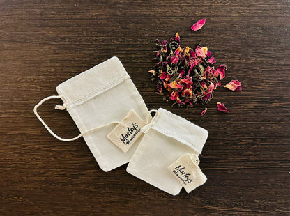 Marley's Monsters Organic Reusable Tea Bags offered at Wild Orchard Tea, image of two bags and loose leaf tea