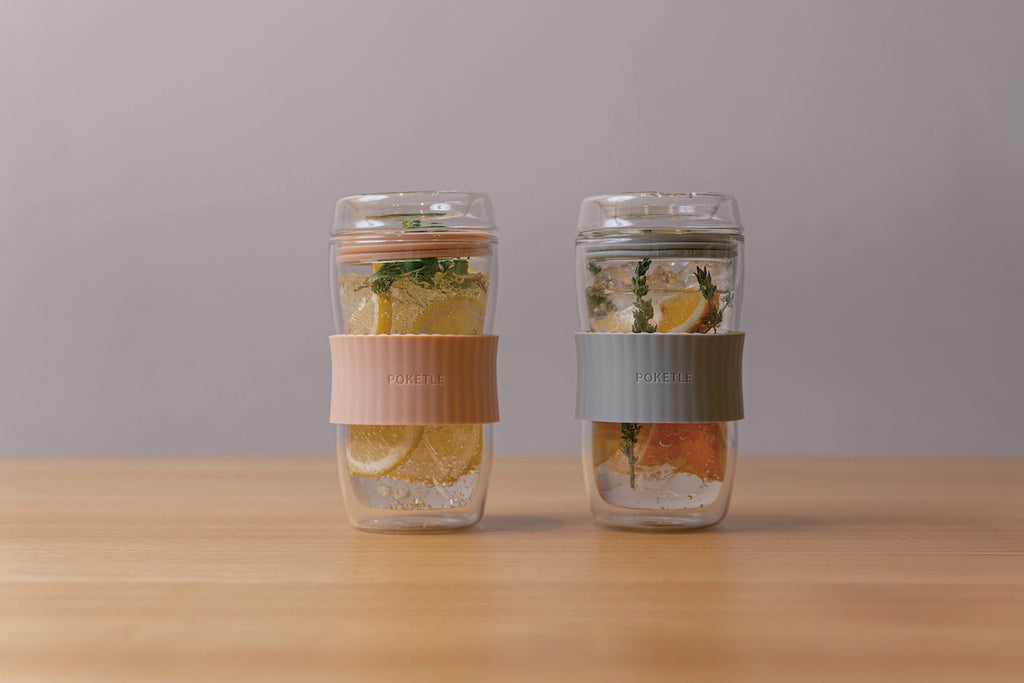 POKETLE All Glass Travel Mug with Silicone Grip at Wild Orchard Tea, image of mugs with organic tea