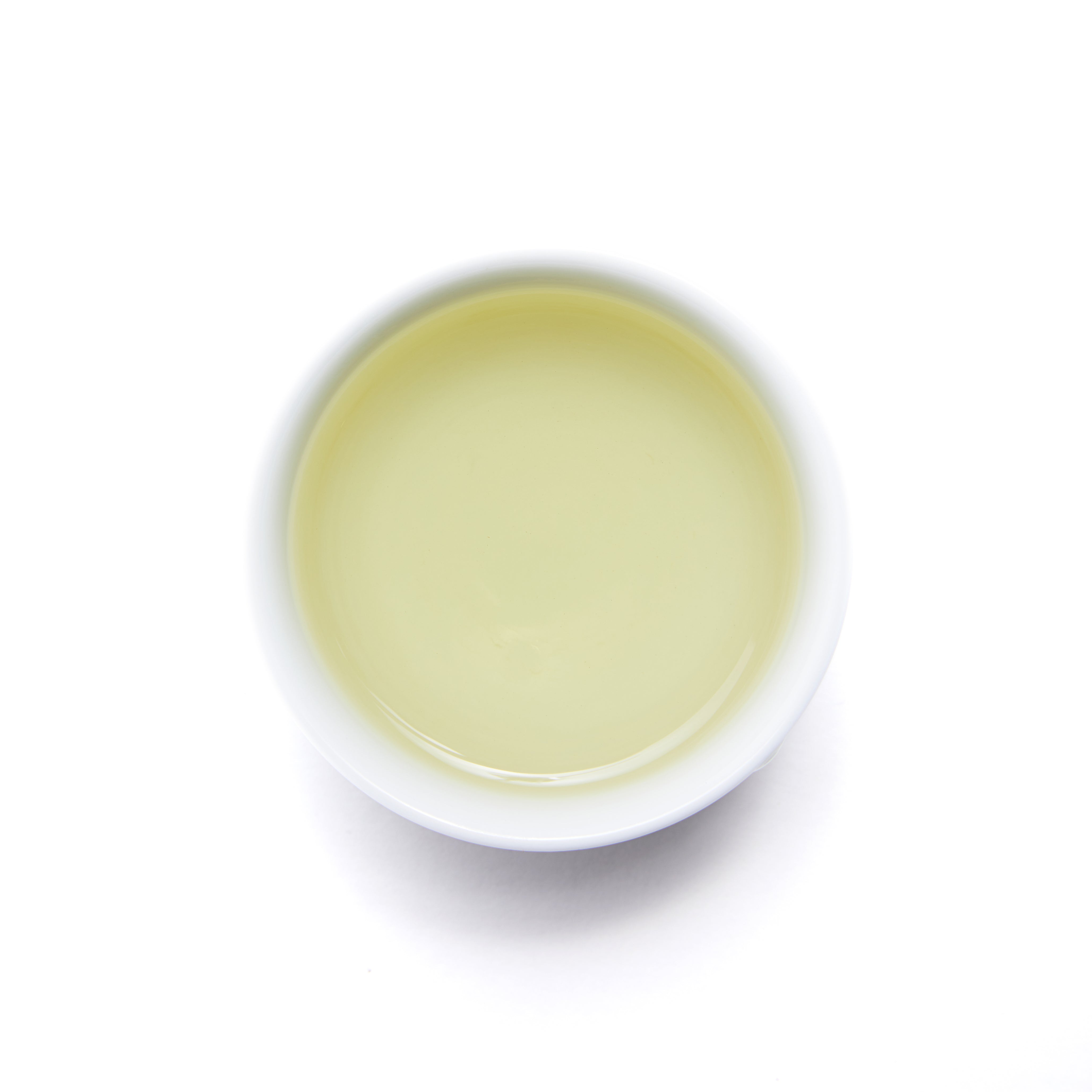 After Rain Green Tea - Loose Leaf by Wild Orchard Tea, image of brewed tea in a cup