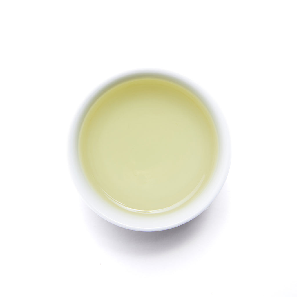 After Rain Green Tea - Loose Leaf by Wild Orchard Tea, image of brewed tea in a cup