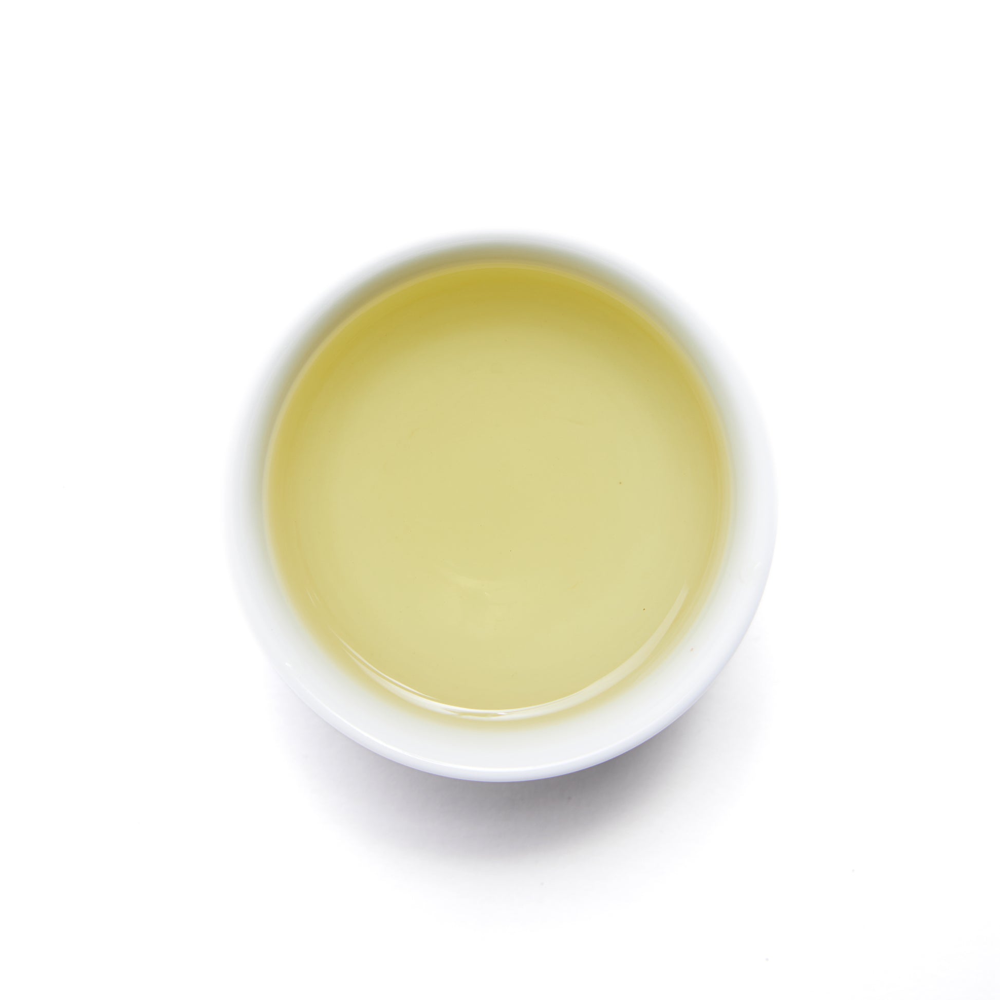 Spring Green Tea - Loose Leaf by Wild Orchard Tea, image of brewed tea in a cup