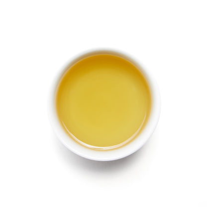 Spring Oolong Tea - Loose Leaf by Wild Orchard Tea, image of brewed tea in a cup